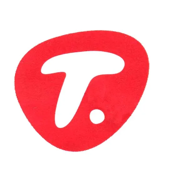 T.