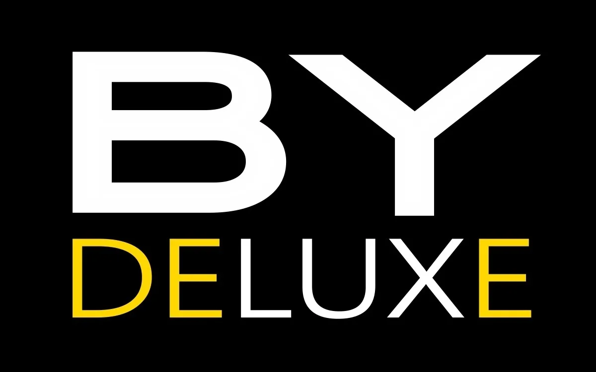 BY DELUXE